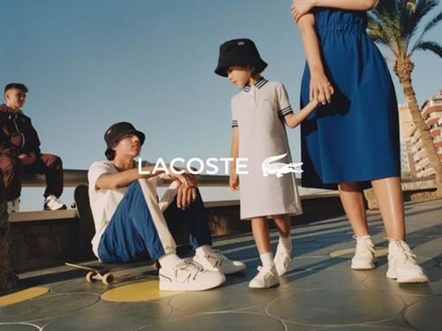 Lacoste mom and daughter chilling with a young skateboarder